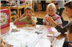 I bambini apprendono l’alimentazione sana con un gioco di società (Foto: USP/Verena Hilber)